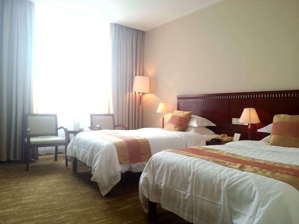 Century Hotel Taicang Cameră foto